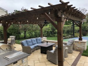 cedar sawn pergola stone paver patio fire pit landscaping outdoor dining northbrook il